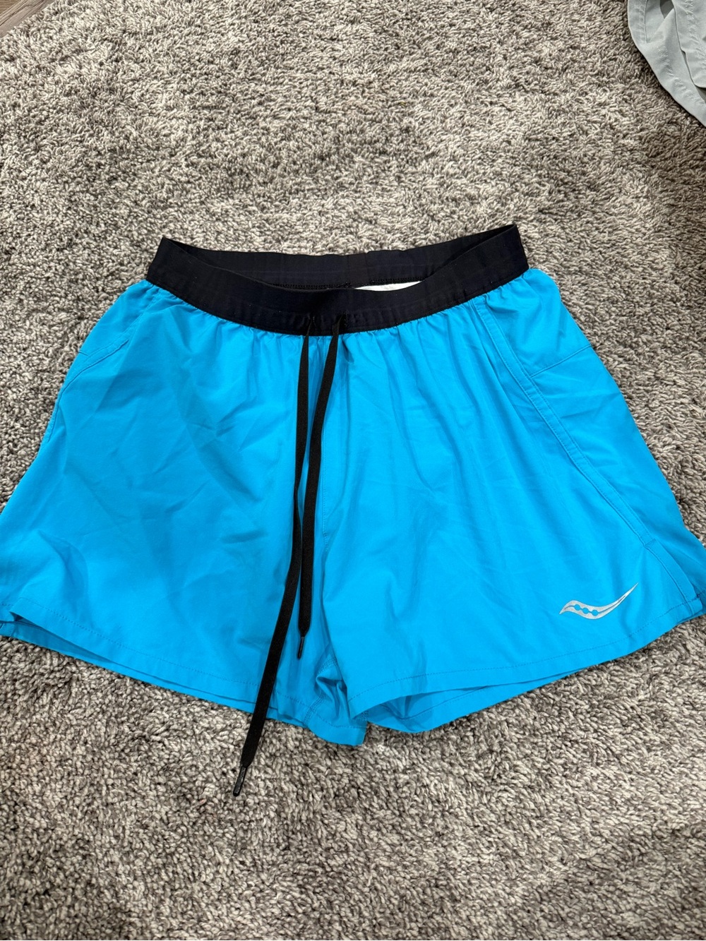 Saucony Teal and Black Running Shorts